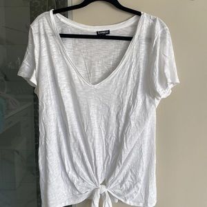 Express size large basic white tee with tie bottom. Worn once